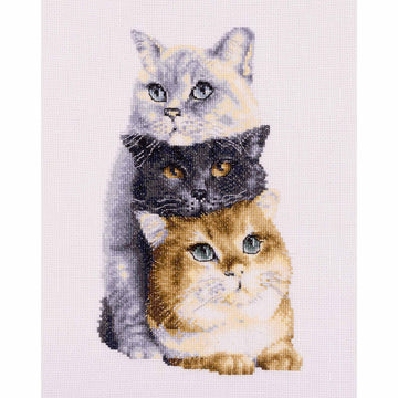 Cross-stitched design of three cats stacked on top of each other with a white background