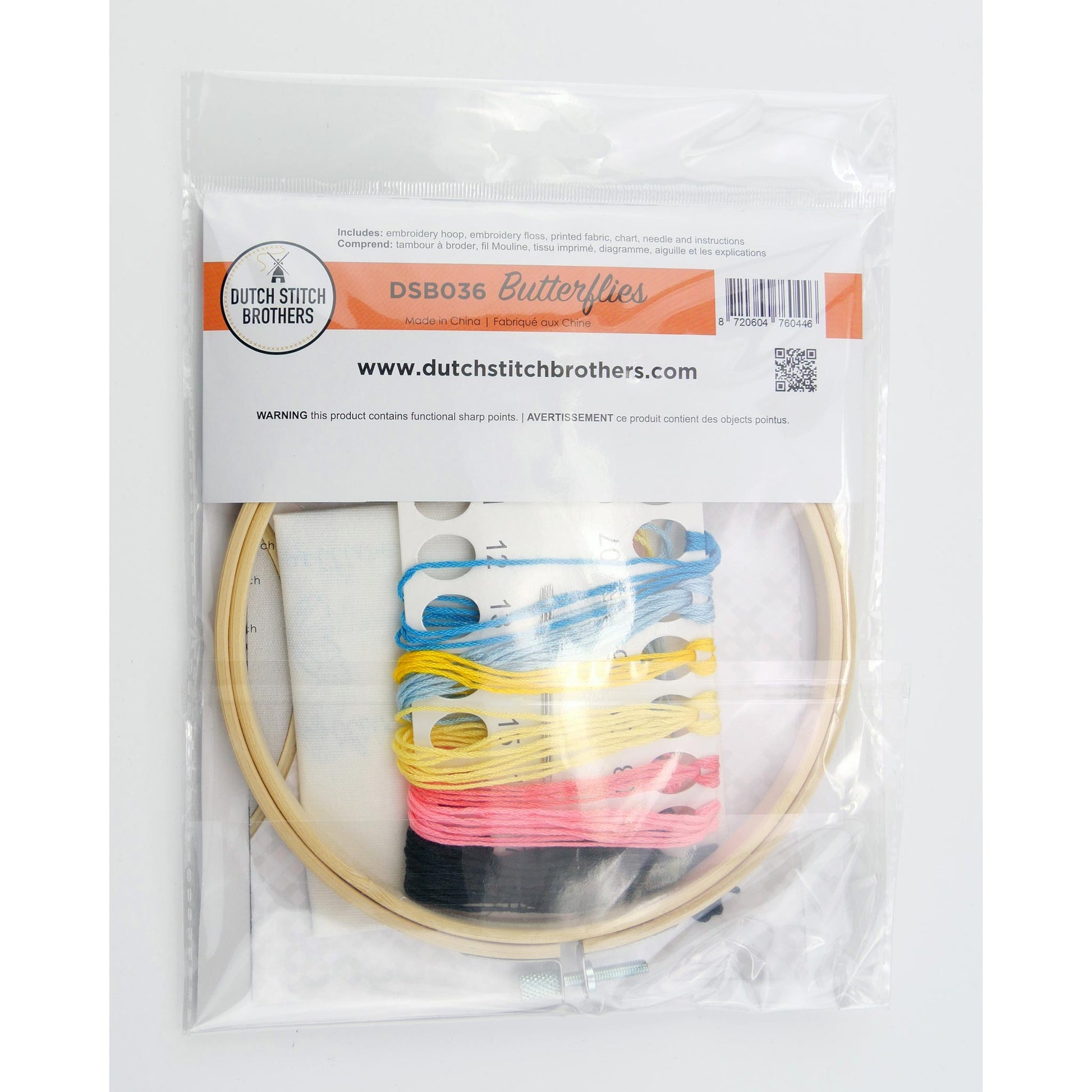 Embroidery hoop with colorful thread and packaging from Dutch Stitch Brothers on a white background