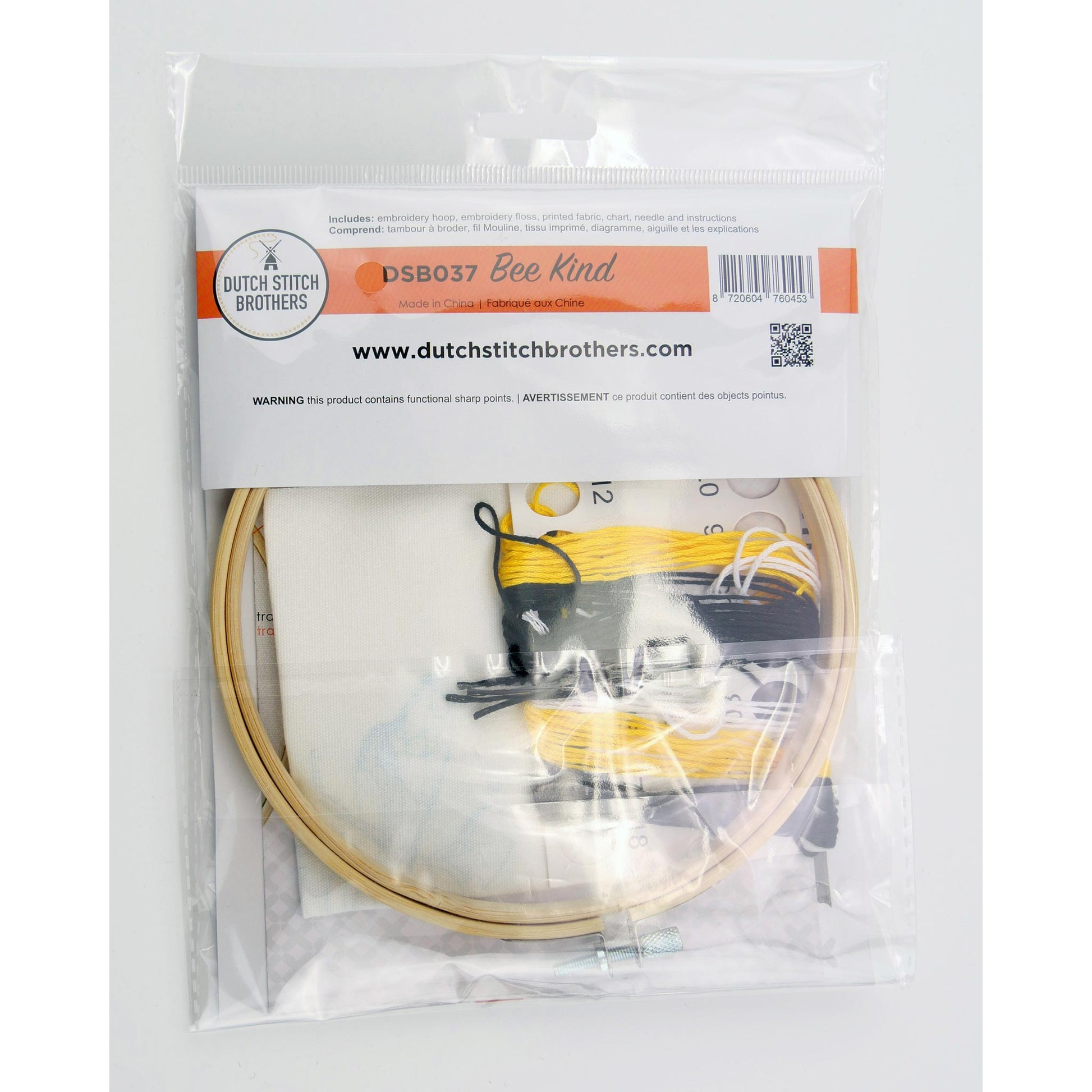 Embroidery kit with hoop, thread, and needle in clear packaging on a white background
