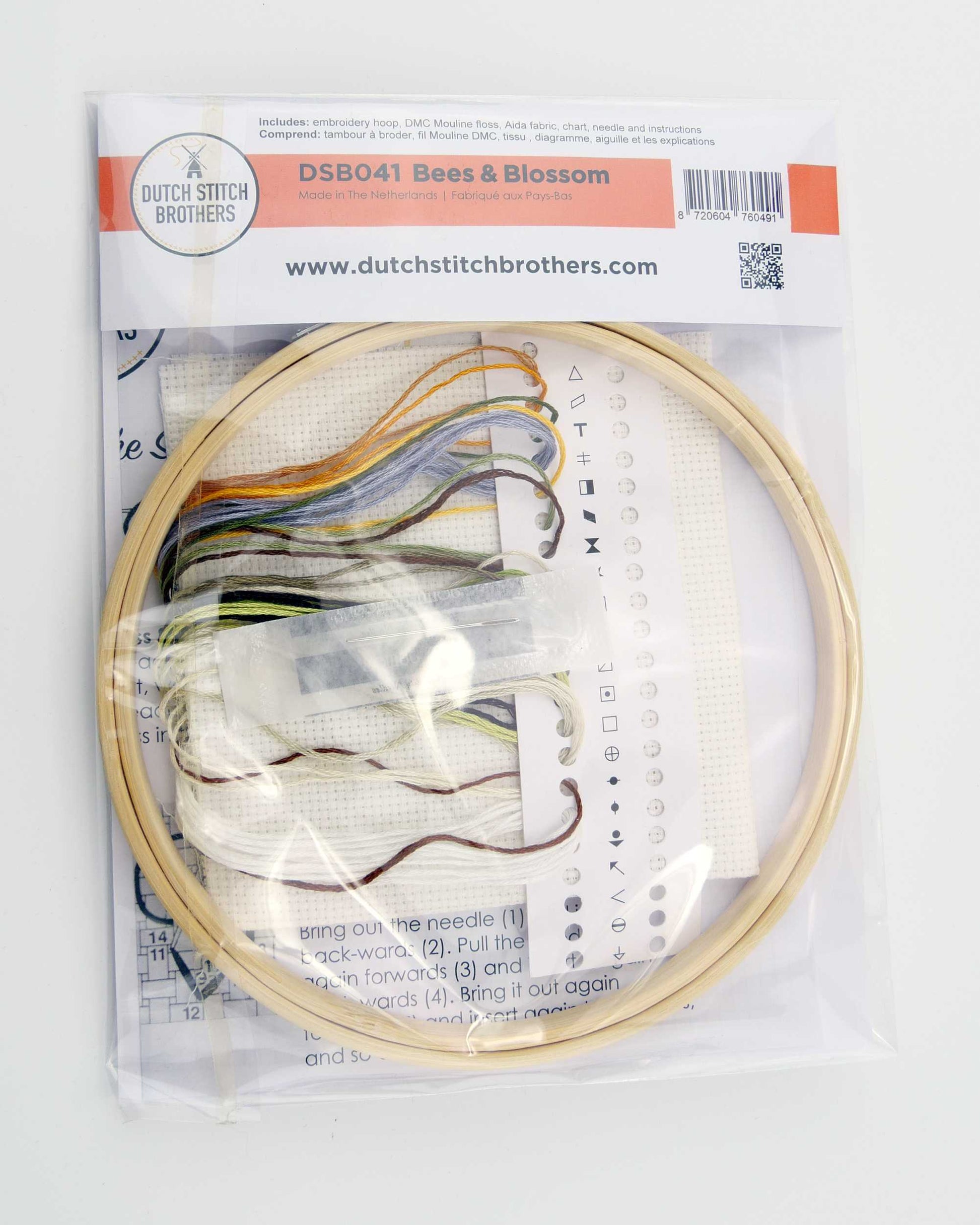 Embroidery hoop with pattern and Dutch Stitch Brothers packaging on a white background