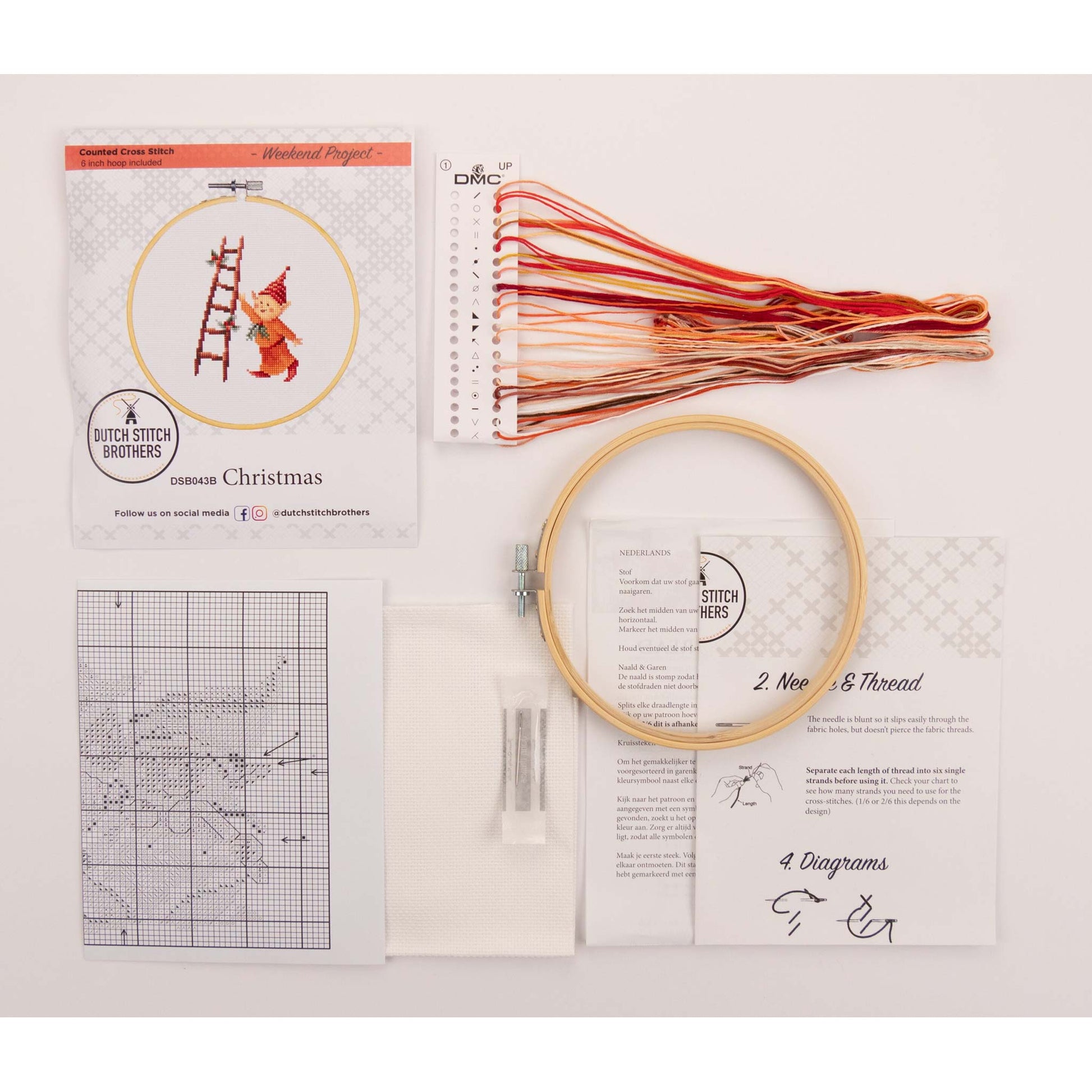 Cross stitch kit package with embroidery hoop, presorted colored threads, Aida fabrics and pattern sheets