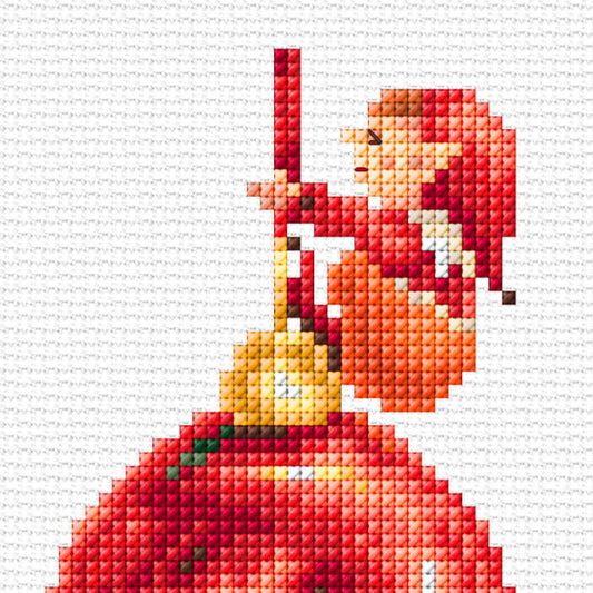 Cross-stitched pattern of an elf in a red outfit on a Christmas ball with a white background